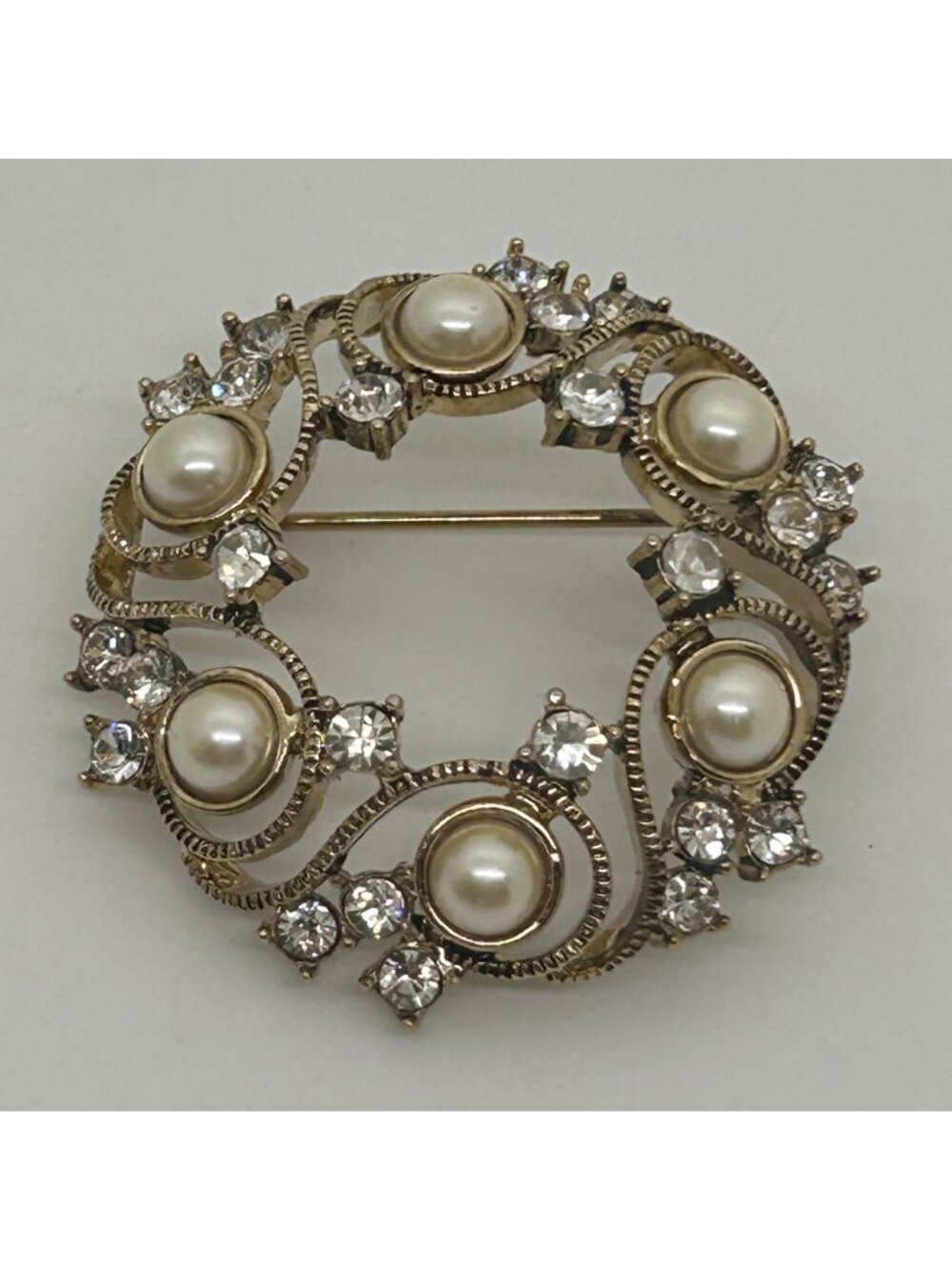 Monet Faux Pearl Rhinestone Brooch Gold Tone Swirl Circle Wreath Pin Vintage